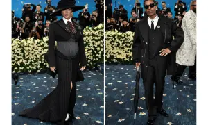 Rihanna, gravid, poserar i en dramatisk svart outfit med hatt. Bredvid henne står A$AP Rocky i en elegant svart kostym.