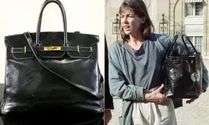 En ikonisk svart Birkin-väska, en av de mest exklusiva i sitt slag, bärs av Jane Birkin.