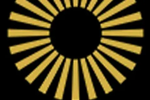 Ett gyllene hjul med strålar mot en svart bakgrund, som en sol eller en symbol för framgång.