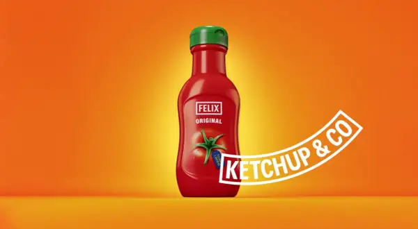 A red Felix Original ketchup bottle with a green cap on an orange background.