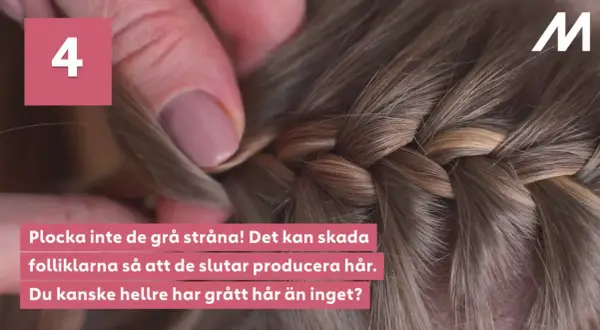 En fläta med vackra nyanser av grått och brunt, en naturlig grey blending. En hand drar försiktigt i en grå strå.