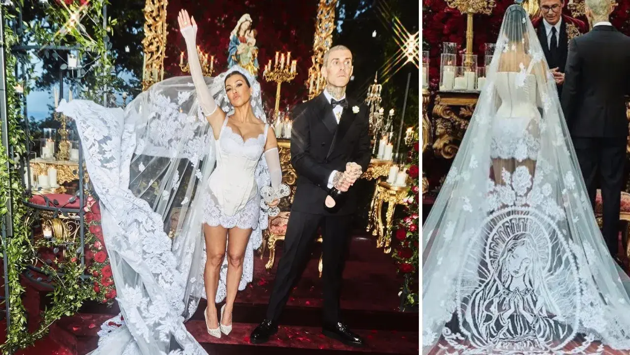 Kourtney Kardashian i Travis Barker firar sin kärlek. Kourtneys korta kourtney kardashian wedding dress med slöja är en dröm i spets.