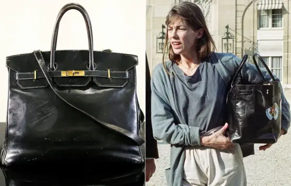 En ikonisk svart Birkin-väska, en av de mest exklusiva i sitt slag, bärs av Jane Birkin.